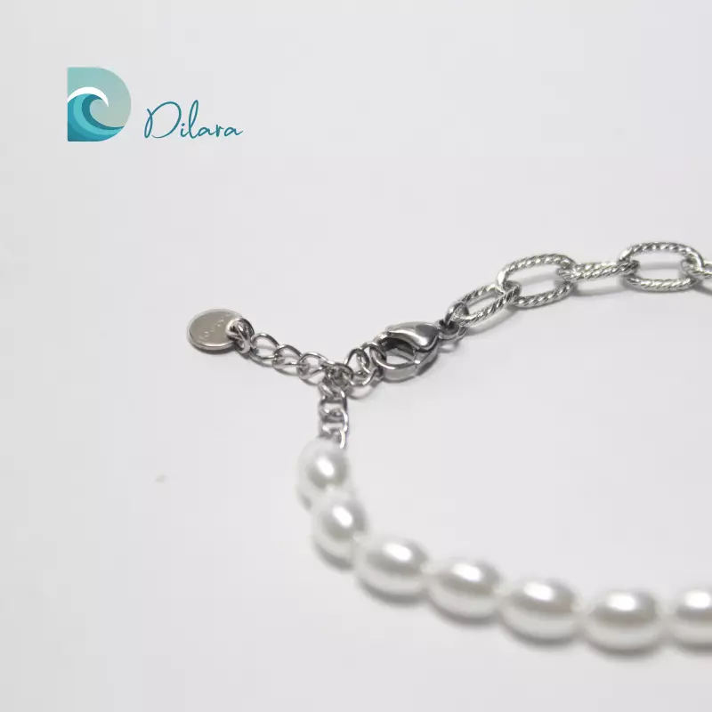 Pulsera de Acero y Perlas con Colgante de Corazón